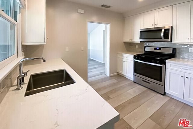 1229 Smithwood Drive, Los Angeles CA: https://media.crmls.org/mediaz/745fe86e-6472-44d7-b217-9c681defba54.jpg