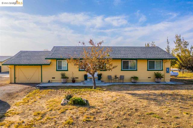 3150 Bixler Road Brentwood, California Single story ranch style home on acreage with a barn area! Open floor plan upon entry with lots of light and big windows to showcase views of property. Gourmet kitchen with lots of storage space, free-range oven/stovetop, bar seating and eat-in area. Large family room with ceiling fan and corner stone wall with cozy fireplace to keep warm on cold winter nights. Master bedroom with walk-in closet and master bath with shower. Office space perfect to work and study from home. Property is completely fenced, has a 3 stall barn with tack room and brick paver center aisle, large sand riding arena, plenty of parking and open space for "toys," dog run and is the perfect home for a family with love for animals! Enjoy all the amenities of country living and still be minutes away from restaurants, shopping, the Delta waterways and Orwood Resort.