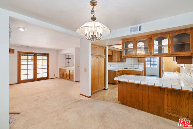 Dining Area + Kitchen + Living Room