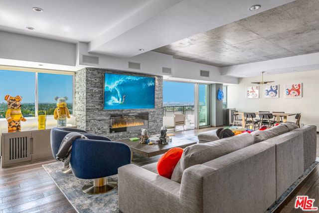 1155 N La Cienega Boulevard 602 West Hollywood, California Welcome home to the ultimate conveyance of sophistication in this West Hollywood compound complete w/sexy downtown views right in the heart of all the action. Walk to and from all the best dining, gyms & bars, zoom out to work right in-between Sunset & Santa Monica Blvd. The building includes 24/7 valet & concierge waiting on your every need, an on-site dog park, gym, sauna & shower, large pool deck, pool/spa. The units open floor plan offers great entertaining space and high ceilings that lead to Fleetwood pocket doors which open up to a large balcony w/expansive city views. Hardwood floors throughout, recessed lighting and smart home upgrades. Italian marble counters in the kitchen w/high-end stainless steel appliances. No expense was spared when this unit was redone. Large master bedroom and walk-in closet, Italian marble shower with 2 showerheads & additional sexy rain shower. Start living the quality of life you deserve, this unit will sell fast.