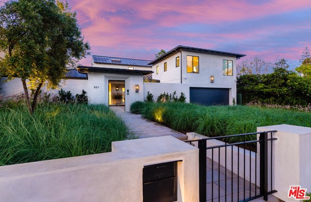 521 26Th Street Santa Monica, California Stunning 2020 New Remodel! This "California Dreaming" Modern Farmhouse style home is in close proximity to Brentwood Country Mart as well as Brentwood Country Club. Featuring French white oak floors throughout, this home has 4 bedrooms / 4.25 bathrooms all en suite with Italian ceramic and porcelain tile including stone shower walls. The master bath includes a steam shower and soaking tub, while the master bedroom opens out to a porcelain tiled balcony. A sleek open kitchen with Neolith porcelain countertops, Wolf and Sub-Zero appliances and integrated Sub-Zero wine refrigerator expands to a great room which combines exceptional entertaining indoors and outdoors. The collapsible sliding glass doors open to an entertainment space featuring a newly remodeled pool, spa, separate fire pit sitting area and built-in BBQ. Pre-wired Smart Home ready, hardwired ADT Security and camera system with remote access, exterior gas lamps outside and an enclosed front courtyard.