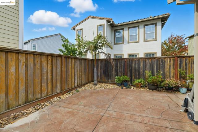 Fenced backyard featuring a patio area