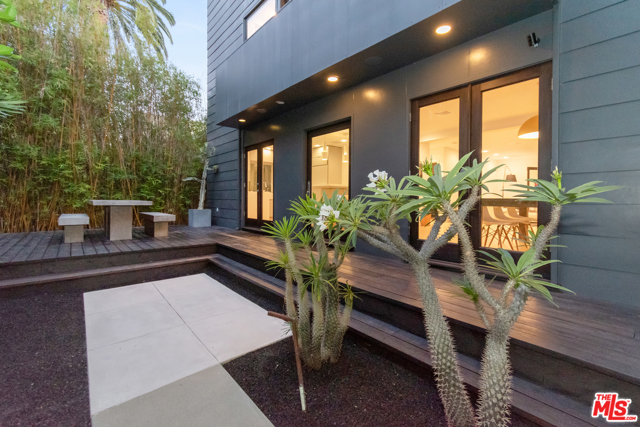 2417 Mckinley Avenue Venice, California Located on one of the best streets in Venice, located just blocks away from the historic Venice Canals and a quick bike ride to the eclectic shops on Abbot Kinney Blvd, this stunning Venice Zen Compound features the latest in modern living and finishes. Built by renowned architect Barbara Bestor, this 4 bed, 5 bath home is tucked behind large hedges providing serenity and privacy. This sought-after open floor plan provides ample room to enjoy time at home with family & friends. A light and bright entry welcomes you into the modern kitchen with Sub-Zero Fridge, Miele Oven and Bosch Range featuring center island boasting Caesarstone countertops that open up to a breakfast area and living room. Spacious bedrooms are perfect for creating a personal retreat or home office, making this a perfectly versatile home. Enjoy the stunning view from the sleek deck and then unwind in the Zen-like yard. This layered home offers plenty of space to relax & relish in the beach weather all year long.