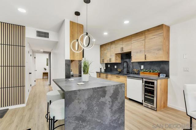 5055 Collwood Way, San Diego CA: https://media.crmls.org/mediaz/75def6d0-b4ad-4a42-8ce6-6f9cd3bd569b.jpg