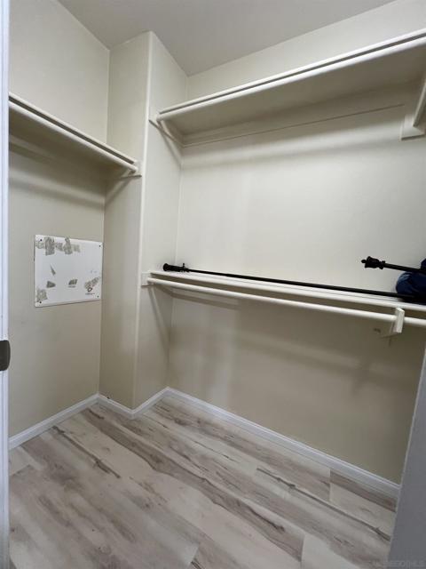 WALK IN CLOSET IN MASTER SUITE BEDROOM2.