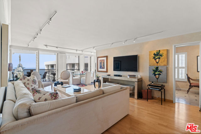 201 OCEAN Avenue 1904-1905B Santa Monica, California Incredible designer finished 3 bedroom/3.5 bath + den corner unit Penthouse (2 combined units of 2,400+sf) with panoramic ocean, mountain and city views from all rooms, located in the iconic full service Ocean Towers building. With a stunning spacious floor plan that includes living room with beautiful light hardwood flooring. Double sliding doors from dining and living rooms open to tiled balcony with spectacular ocean and sunset views. Large kitchen with granite countertops, double ovens and breakfast area with mountain views. Open den with builtins and powder room leads to hallway with 3 bedrooms including a luxurious, oversized grand primary suite with built-in office area, spacious sitting area, double sliding doors to relaxing large balcony overlooking city views and custom double sized walk-in closet and bonus large storage closet. Marble finished primary bathroom with dual basins and shower. 2 additional bedrooms, one with ensuite updated bathroom with onyx stone finishes. Features include plantation shutters throughout, crown molding, dual zone AC/heat and 2 balconies. Uncompromised resort living at its finest with 24 hour valet, pool/gym, event plaza and recreation room. 3 secured parking, extra storage, in unit laundry area, pets ok. Enjoy Santa Monica's coastal living in one of the premier Ocean Avenue settings.