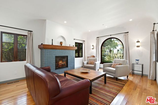 538 16th Street Santa Monica, California Done to the nines, this north of Montana home has been exquisitely remodeled. Taken down to the studs in 2017, every surface, door & window was replaced with unerring attention to detail. From the open concept chefs kitchen with Thermador appliances & solar-operated "fresh-air" skylight, to the west and south-facing family room opening to the backyard, this home exudes quality and excellence. The elegant, front-facing living room features a spectacular fireplace and arched window showcasing the drought-resistant landscaped front yard. The newly constructed primary suite boasts windows on three walls for amazing cross ventilation, a large walk-in closet and a sumptuous primary bath. The detached, spacious bonus room with half bath and closet is perfect for a home office. Just some of the features of the 2017 remodel include: construction of a new oversized 2-car garage/work area with attached bonus room/half bath; new plumbing and electrical throughout, new roof, stucco & drywall, new water meter/main, new gas meter/line, new sewer line, new HVAC in main house and mini split in bonus room, new tankless on-demand water heater, solid oak wood floors throughout main house, engineered wood floors in detached bonus room. Electric and cable utility feeds from alley have been BURIED. Must see to fully appreciate this rare offering.
