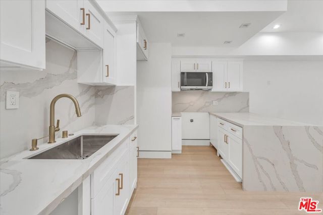 5561 1/2 El Canon Avenue, Woodland Hills CA: https://media.crmls.org/mediaz/76adfe1f-8110-45a7-9040-022d86ce7a67.jpg
