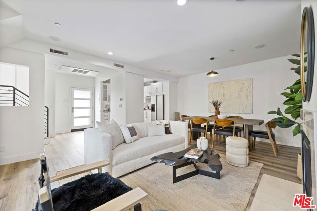 1537 16TH Street 105 Santa Monica, California As we reflect on last year and begin 2022, we understand the value of where we live. Our home is where we work, rest, play, and create new memories. Unit 105 at 1537 16th Street offers comfort, style, and tasteful design. We absolutely love the newly installed flooring and color palette chosen to create a calm and inviting space throughout. Our favorite features of this modern three-level condo are the rooftop deck with Santa Monica views and the gorgeous barreled ceilings in the primary bedroom. Relax outside on the first level patio or enjoy cooking meals in the gorgeous kitchen that opens onto a light-filled dining and living room. The master bedroom upstairs offers a walk-in closet, and an en-suite bathroom with a double sink vanity, tub, and walk-in shower. Work from the guest room or the 2nd level landing. Store your bikes and car in the oversized private direct access two-car garage. At 16th Street, you are moments from the beach, shopping, the metro, and amazing Santa Monica eateries - Lovi Cafe, Santa Monica Coop, and Tartine Bakery are a must for neighborhood locals. Come and visit!