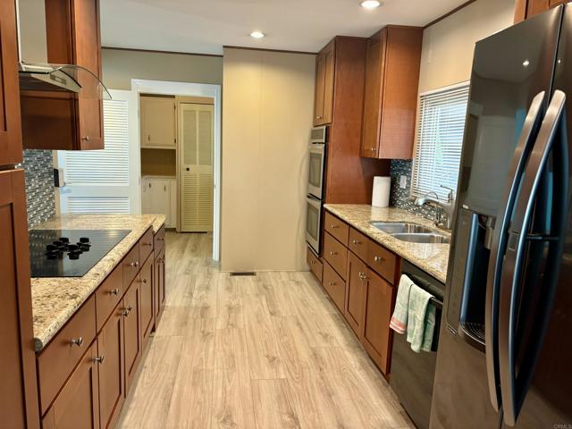 5420 Kipling Lane, Carlsbad CA: https://media.crmls.org/mediaz/77a4a635-0cb7-4286-97cd-e18f0efa89cd.jpg