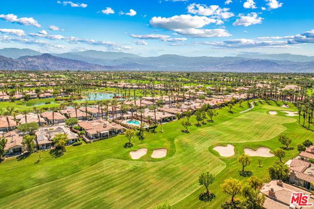 756 Red Arrow Trail Palm Desert, California Located within the prestigious Golf Course Community of Indian Ridge Country Club. This much sought after Acacia 5 model boasts 2368 sq ft of light, bright spacious interior living. The privately gated courtyard entry leads to a welcoming foyer and pristine interior featuring an inviting formal dining and living room accentuated by volume ceilings, warming fireplace and wall of glass offering direct access to the rear patio and gorgeous golf course views. The adjacent sunlit kitchen boasts ample storage, courtyard views, breakfast bar and cheery breakfast room. Three spacious bedrooms include a serene primary bedroom offering a private courtyard, expansive walk-in closet and en-suite bath with double vanity, stall shower and separate soaking tub. The two secondary bedrooms are adorned with sliding glass doors and en-suite bathrooms. Only steps to the community pool and unobstructed views of The Grove Course with lake and San Jacinto Mountain range beyond. Offered furnished per inventory list. HOA amenities include earthquake and fire insurance, exterior gardening, tree trimming, exterior paint, trash, roof cable and wifi. Inquire with the IRCC Membership office for availability and details. ********