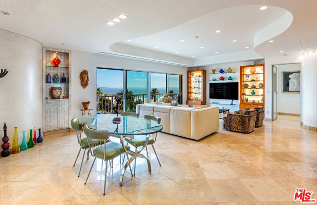 101 California Avenue 704 Santa Monica, California This gorgeous Santa Monica condo features 2 beds, 2.5 baths, and 1,501 square feet of chic, refreshed living space. Re-envisioned by an Italian architect and interior designer, this stunning architectural home is a contemporary retreat. The elegant interior includes honed travertine floors, magnificent ocean views, and imported Italian Rimadesio doors. The living room showcases a Venetian plaster curved accent wall, a real silver leaf built-in cabinet, Fleetwood windows, and Italian LED recessed lighting. The custom kitchen has Blum cabinetry, Miele appliances, and granite countertops. The primary suite includes motorized blackout shades and a luxe bathroom with mosaic niches, a Duravit toilet and sink, and a Toto soaking tub. The building includes a pool and a garage provides ample storage. Updated features include new electrical, plumbing, mechanical, venting systems, and soundproofing. Here, exquisite custom details and quality finishes will enchant the eyes and spirit. Located in the heart of Santa Monica, steps from the beach, 3rd street promenade, restaurants, shops, farmers market, and the famed Santa Monica Pier.