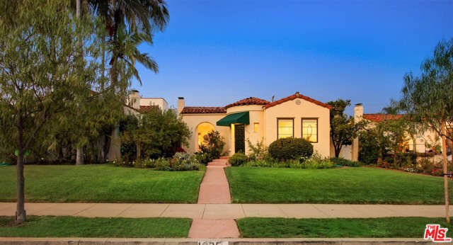 1035 25Th Street Santa Monica, California Charming beautifully upgraded single level Spanish home located North of Wilshire Boulevard. New custom kitchen with handmade tile, skylight, and Viking appliances. There is subtle but beautiful Spanish architectural detail throughout the home. The floors are hardwood, there is a wood-burning fireplace in the living room, new windows, and a new central heat and air system. The backyard patio is covered and there is a quaint side patio, both with imported re-claimed Saltillo tile. There are French doors and several glass-pained side doors leading to patios. The front yard is grassy, and the back garden is a gorgeous Santa Barbara style retreat. The detached garage fits 2 cars, with a separate carport that accommodates two additional cars. Bathrooms are newly remodeled, high end. All upgrades were for the owner, not a flip property. The home has an incredible walking score: it is close to several grocery stores, coffee shops, restaurants, Franklin Elementary, & Douglas Park.