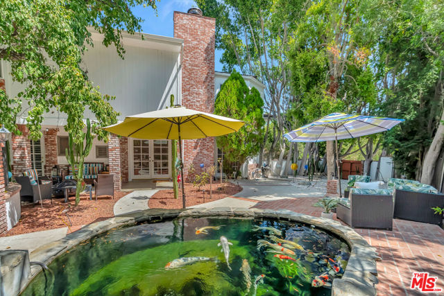 5025 Delita Place, Woodland Hills CA: https://media.crmls.org/mediaz/79966369-7b64-49af-aed2-cb44f4aa8a29.jpg
