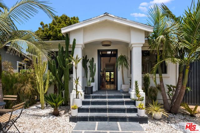 1046 OAKWOOD Avenue Venice, California An oasis in the heart of prime Venice, let yourself be transported to a more tranquil state of being at 1046 Oakwood Ave. Reimagined by star designer Studio John Sharp, this quintessential 3 bed 2 bath Venice traditional has evolved into a lush contemporary sanctuary. Enjoy cool sunset drinks from the west-facing front porch overlooking your exquisitely xeriscaped front yard. The vaulted, beamed ceiling sitting room, bathed in the natural light of 6 skylights invites you in. A direct sightline from the front of the house to the back yard immediately captivates the eye. The kitchen and formal dining room flow seamlessly with each other, and together with the home's exterior, giving you a sense of volume and space from anywhere in the house. 3 generous bedrooms give you the freedom to configure and customize your lifestyle. Two sets of french doors, in the primary bedroom and the dining room, connect you effortlessly with the private back patio - and this is where the home truly comes alive. Step into your fully private, hedged back garden / zen spa. Sun shade sails and a natural green canopy diffuse the abundant California sunlight as you enjoy the gas fire pit with banked built-in seating, ice plunge, private outdoor shower, and Swedish cedar dry sauna. The green patio further wraps around to your built-in gas grill / outdoor cooking area just off the main kitchen. The freestanding garage has been finished and is perfect as an office or entertaining bonus room. Steps to the best of Venice yet worlds away, your private sanctuary awaits at 1046 Oakwood Ave.