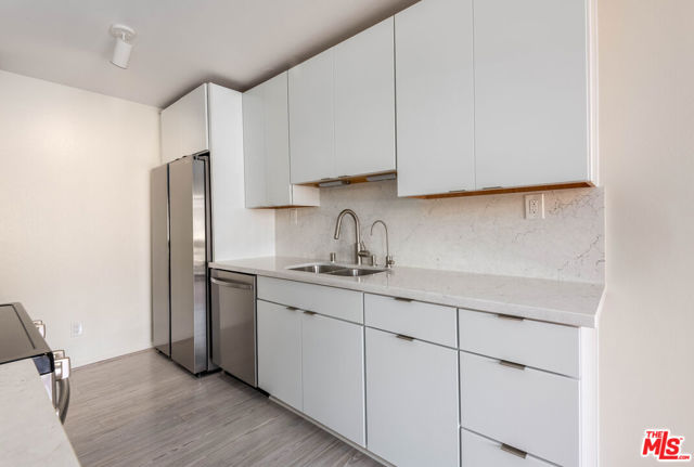 6050 Canterbury Drive, E214 photo 6