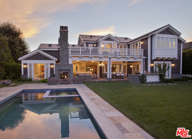 314 Toyopa Drive Pacific Palisades, California Stunning traditional situated in the highly sought-after Huntington Palisades, just a short distance from the beach and the Palisades Village. Located on the rim side of Toyopa where properties very rarely become available. Upon entrance, guests are captivated by the beautiful architecture, indoor-outdoor flow and the abundance of natural light. The living room features a fireplace and sliding pocket glass door that leads out the secluded covered patio with fireplace, TV and build-in BBQ. The backyard is an entertainers dream with lush privacy hedges, pool, spa, putting green and zen garden. The gourmet kitchen boasts Sub-Zero built-in refrigerator and freezer, Wolf appliances, breakfast nook and two islands. Upstairs there are four bedrooms, including the Master suite with spacious balcony overlooking the backyard. This is an offering you don't want to miss, this spectacular estate has all the best qualities of California living.