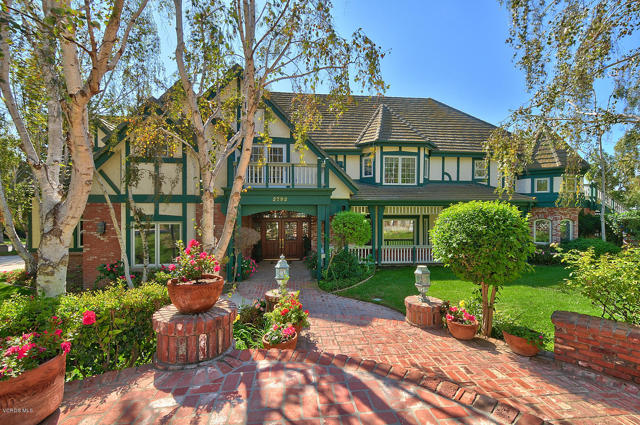 2792 Redondo Avenue Camarillo, California Ultimate Multi-Family Compound with Massive Family Room! This 10 Bedroom, 12 Bath estate is perfect for multi-generational living as well as lavish corporate entertaining. Gracious formal dining room, family room and formal living room.Spectacular craftsmanship and quality. Wood floors, crown moldings, leaded & beveled glass windows & imported iron & crystal chandeliers can be found on the main level. The granite center island kitchen has chefs kitchen with Viking Oven Range with commercial quality hood, , Wine chiller,huge granite island .FLEXIBLE FLOOR PLAN also includes 1 bedroom, & separate office on the main level. Upstairs, a spacious master suite w/ attached marble bath, huge walk-in closet, fireplace, sitting room & private balconyThe 2-bedroom GUEST APARTMENT within the main residence has a full kitchen w/Sub-Zero, fireplace, balcony & pvt. lndry. ENDLESS ENTERTAINING POSSIBILITIES in the almost 1,200 sq ft Great Room w/french doors opening to English Garden court yard. The highlight of the Great Room is the Professionally equipped bar which opens to the truly resort style pool/spa w/waterfalls. The Park like grounds also include a 1 BED,1 BATH POOL CABANA, gazebo, basketball sport court and fire pit. The most exquisite quality.