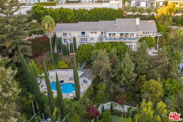750 Sarbonne Road Los Angeles, California A rare opportunity to remodel or build new on one of Bel Airs most desirable streets, surrounded by multi-million dollar estates. Spectacular panoramic city views and great privacy. Gracious Contemporary home on a large lot with romantic pool. Gated driveway with ample parking, 6 bedroom suites, gourmet kitchen, secondary prep kitchen and terraces overlooking the city lights. Beautiful living in prime lower Bel Air.