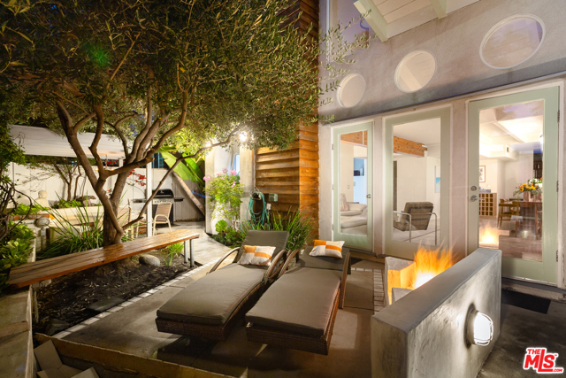 806 Pacific Avenue Venice, California What you need to know about this wonderful property: Beautiful one of a kind Architectural design. 3044 total sq ft with the front of house encompassing 3 bedrooms and 3.5 baths. Rear unit has 2 bedrooms 2 full baths a kitchen and living space. Travertine, slate and laminate floors thru out, custom made Baltic Birch cabinets in kitchen. Two fireplaces and an outdoor fire pit to enjoy those cozy evenings. // What our sellers love most: Perfect location, modern design with large comfy rooms, plenty of sunlight and great outdoor space. // This homes personality is: Relaxed but refined, beachy but not barefoot. // Your favorite room will be: The living room with abundance of light coming through the porthole and the outside sitting on the cedar bench keeping warm with the fire pit. // Best time of (year/day): All year long enjoying the beautiful weather and ocean breezes. // Notable about the neighborhood: Location, being able to walk to everything and enjoying Rose Cafe and Gjelinas.