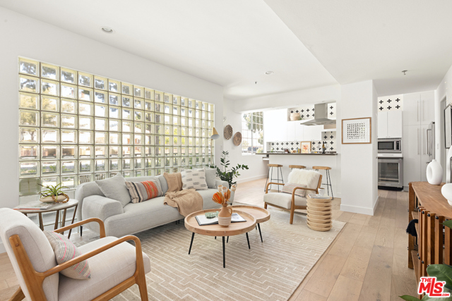 1330 Stanford Street A Santa Monica, California The possibilities are endless with four floors of light, space and privacy for your family. This luxurious and dreamy 3BD + office and 5BA modern end-unit Santa Monica home is perfectly located to meet your friends for coffee at Milo and Olive, grab organic delights at Erewhon or stroll over to the Brentwood Country Mart for some great shopping. Understated elegance with a chic designer vibe, three outdoor seating areas plus a new private rooftop oasis to do yoga, entertain or meditate in the Japanese tearoom, with eastern light that casts beautiful shadows on the high ceilings. Spectacular views of the Santa Monica mountains are seen from the bespoke tiled bar that extends out from the top floor bedroom and office. A gourmet kitchen opens to the main living area with new stainless steel appliances and high end finishes throughout, new Toto, Grohe and Duravit fixtures, gorgeous Cle tiled surfaces and wide plank oak floors throughout and custom built in closets. Come take a peek!