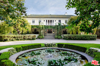 Majestic CA Traditional on over 1.7 acres (74,870 Sq Ft) of gorgeous grounds w/ grt pvcy in the very finest BW Park location. Set off the st behind gates w/ mature gardens, towering trees, circular drive, this gracious estate reminiscent of Pasadena's Tournament of Roses Hse has been painstakingly restored, remodeled & expanded w/ no detail overlooked or expense spared. Beau proportioned main house organized around a ctyd includes formal entry, generous LR, fam rm, cozy library, cook's kitch; & fab master ste w/ sit area, fP, pristine bath & lg fitted closet. 4 addl BR's in the main hse + upstairs plyrm, 2 laundry rms & mudrm. Set in the garden is an equally charming 2-sty gst hse w/ gym, full kitch, liv rm, office/bedrm & two bths. Expansive park-like grounds include terraces, outdr FP, fountain, rolling lawn & lg pl/spa. Extremely rare oppty. Note: The 1.7 acres/74,870 Sq Ft consists of 2 lots (12834 & 12846 Highwood) each over 37k sq ft, w/ 12846 Highwood being vacant/unimproved.