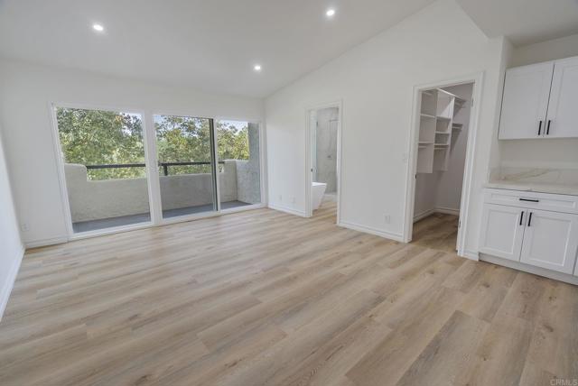 RELAX!  Sunset Skies from YOUR Private Balcony.  What a Retreat!  Whitewashed LVP Floors throughout!