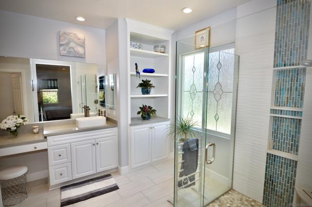 Built-in Cabinets.  walk-in Shower.