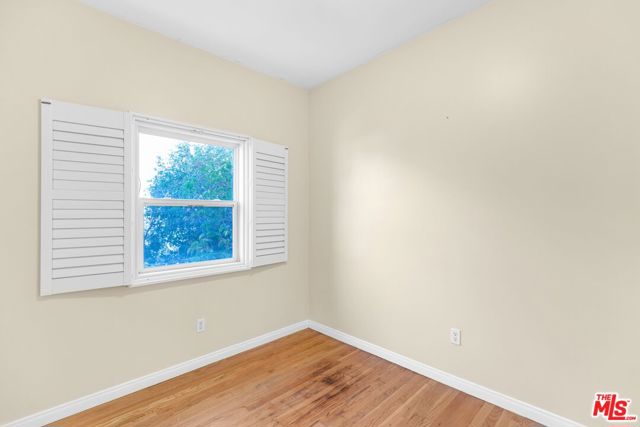 1073 S Mansfield Avenue, Los Angeles CA: https://media.crmls.org/mediaz/7be2c40f-b11f-474f-9d39-ddc89651c20b.jpg