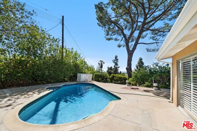 20553 Califa Street, Woodland Hills CA: https://media.crmls.org/mediaz/7db74245-3ae6-459d-8b62-2d1bdb993597.jpg