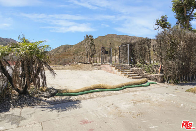Drew Fenton | 18329 Clifftop Way Malibu CA | MLS: 7313440