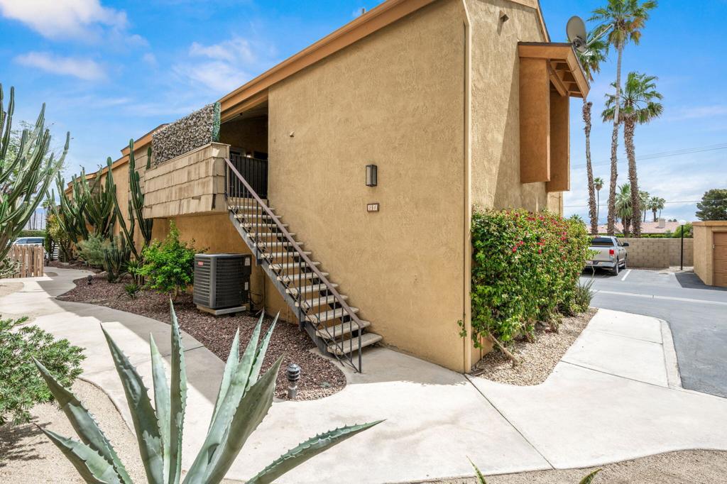 48255 Monroe Street 24 Indio, California Experience resort-style living behind the gates of Quail Lakes! This beautifully maintained end-unit condo offers privacy and comfort with no neighbors below and only one neighbor beside. Featuring 2 bedrooms and 2 bathrooms across 1,018 sq. ft., this upper-level unit is just steps from the Polo Grounds and offers the perfect blend of peaceful living and convenient location.Set in a tranquil community with serene ponds, streams, and mature landscaping, residents enjoy access to a sparkling pool and spa, tennis courts, and a clubhouse. Inside, the home boasts vaulted ceilings that flood the space with natural light, low-maintenance tile and laminate flooring, and a spacious kitchen with granite countertops, a center island, and included appliances.Each of the two primary suites includes a private en-suite bath, while two sliding glass doors lead out to a large private patio with an outdoor laundry closet. A one-car garage and ample guest parking complete the package.Centrally located near shopping, dining, and entertainment, this condo is ideal for full-time residents, seasonal living, or investment.