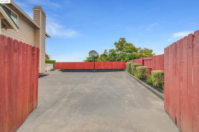 Fenced backyard featuring a patio area