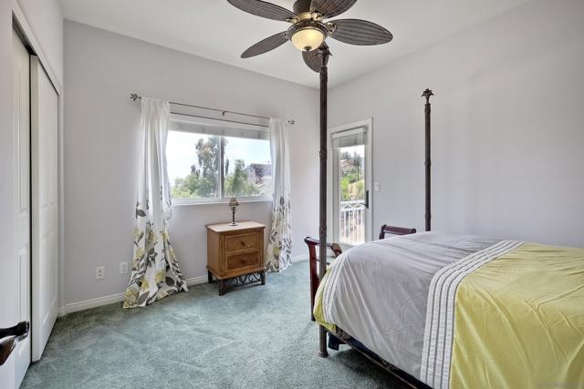 This bedroom has a balcony to access in 1st home.