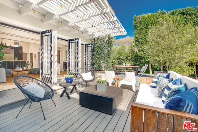 754 Palms Boulevard Venice, California Balancing simplicity, luxury & a modern Craftsman lifestyle that embraces the outdoors, this casually elegant 2-Story, 3BR+2BA home on a 5300 SF lot is situated on one of the best blocks in Venice. Exquisite details begin with the inviting front porch that spans the width of the house. Inside, view the beamed ceiling in the open-family room & kitchen with abundant natural light streaming through 6 skylights. 3 sets of French doors open to the private backyard sanctuary with exterior living room, al fresco dining area, spacious backyard & beautiful gardens with room for a pool. Gourmet kitchen includes Caesarstone countertops, limestone flooring & professional stainless appliances: Sub-Zero, Wolf & Bosch. Other appointments include custom-bleached oak floors, architectural lighting, 2 luxuriously appointed baths with custom-built vanities, Caesarstone counters, limestone flooring & Grohe, Toto fixtures. 1 1/2 car garage + parking for 2 more. Ideally located 2 blocks off Abbot Kinney.