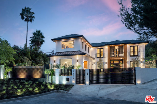 9814 Curwood Place Beverly Hills, California Boundless luxury encompassed by a brand-new, Modern estate, is sited on over 33k sq.ft. of pristine, gated Beverly hillside. On a cul-de-sac in the canyons, between Franklin and Benedict, just south of Beverly Park, sits your nearly 10,000 sq.ft. dream build, showcasing peerless California living in one of the most iconic neighborhoods in the city. Through a glass doorway, you are immediately greeted by a clean-cut, wooden entry foyer illuminated by a custom chandelier and museum lighting. Opulent by nature, sunlight trickles through organic Angeleno forestry and through a disappearing glass wall to paint your sumptuous living room, Miele kitchen, and fireplace. Elegance awaits in the formal dining with an original chandelier and wood-beamed ceiling. Of the 6 impressive bedrooms, the primary suite is substantially superior: Dual baths, dual closets, fireplace, lounge space, private balcony peeking out onto the city, and state-of-the art A/V system. Designed for comfort and entertainment, every room is an exquisite display of just that. Between the 300+ bottle temperature-controlled wine room, gym, office, and home theater with cutting edge technology, there isnt a reason to leave. With the Los Angeles cityscape at your fingertips, a massive backyard complete with a covered patio, cabana, wood decking, and infinity edge pool, 9814 Curwood transitions quickly from a stunning home into an idyllic destination. With a 3-car garage and additional parking for 6, entertaining is truly made effortless.