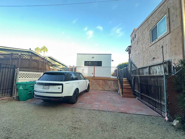 Spacious parking for 2 vehicles in rear of home.