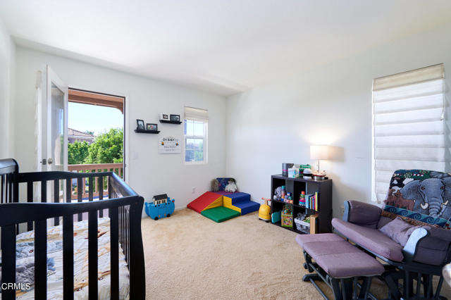 Secondary bedroom with balcony