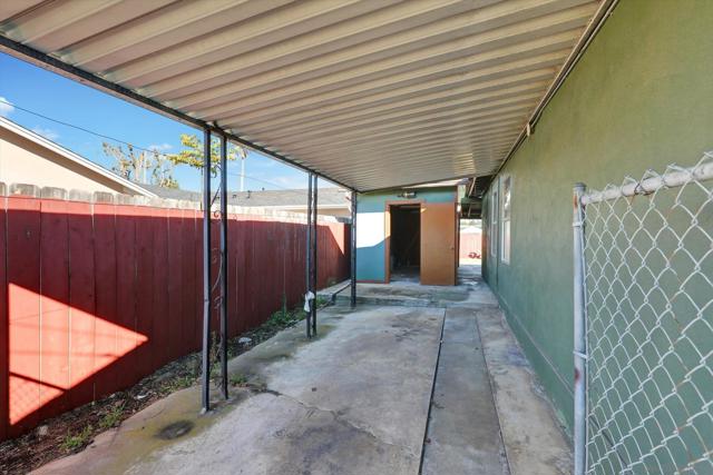 exterior side - carport and shed