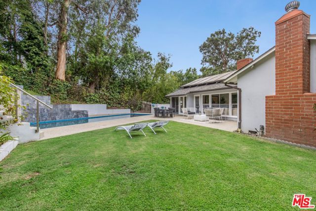 8056 Mulholland Drive, Los Angeles, California 90046, 3 Bedrooms Bedrooms, ,3 BathroomsBathrooms,Single Family Residence,For Sale,Mulholland,24401067
