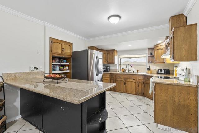 8300 Cacus Street, Spring Valley CA: https://media.crmls.org/mediaz/820a4c52-f890-4b34-93bc-e25355ad7289.jpg