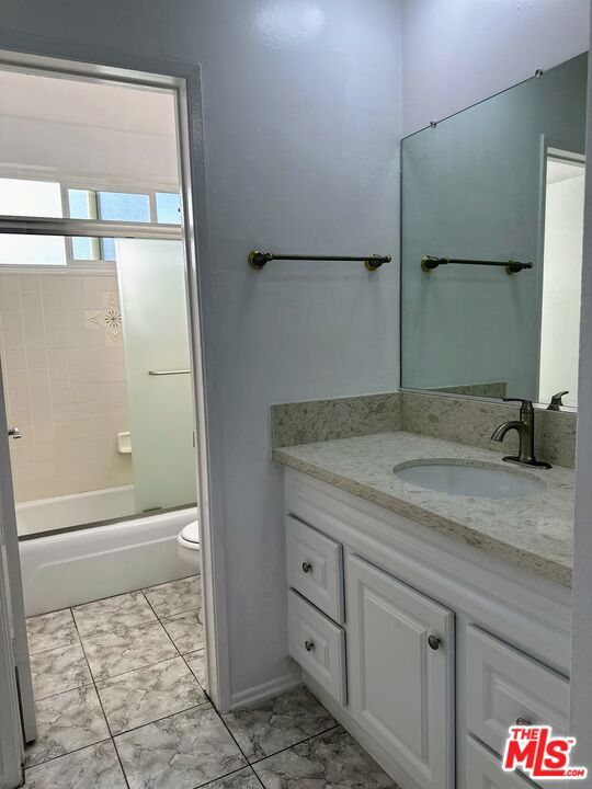 Spacious bathroom with double sink vanity