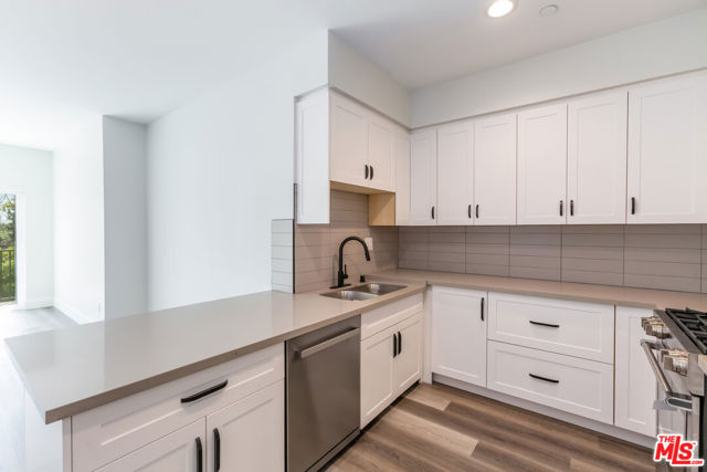 857 N Hayworth Avenue, Los Angeles CA: https://media.crmls.org/mediaz/8292cd3d-d7dd-4a58-b2a5-f94815480d77.jpg