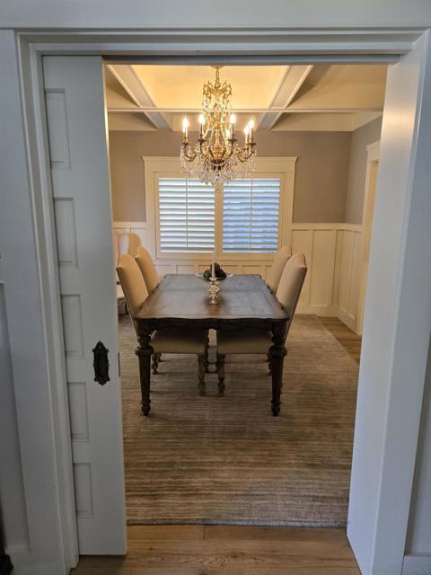 entrance from living room, with pocket door for privacy.