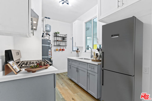 201 N Normandie Avenue, Los Angeles CA: https://media.crmls.org/mediaz/82e25dfd-790c-40f3-a794-4d9d21fad3c0.jpg