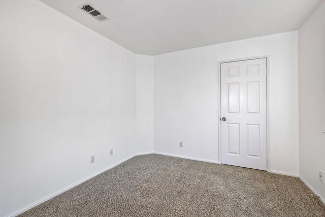 Second bedroom features a walk-in closet. Plenty of room!