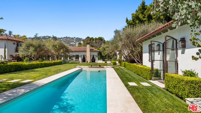948 N Orlando Avenue Los Angeles, California Incredible West Hollywood designer compound like nothing seen before. An oasis-like hideaway offers unique multi structure luxurious live/work options surrounded by tall privacy hedges, olive trees and extensive specimen gardens. Set on a flat, 26,499-square-foot double lot, four structures, totaling over 9,495 square feet of living space, multiple large guest houses, gym/spa, theater and courtyards with fireplaces Evoking the romance of Montecito while incorporating incredible high quality materials and design. The grounds include multiple fountains, al fresco dining areas, pool, spa, outdoor kitchen and professional skate park. Once inside the gates a private insulated world unfolds yet only moments walking to Melrose Place, world class shopping, cafes, galleries, design districts, studios and legendary locations in Los Angeles. A one of a kind opportunity!