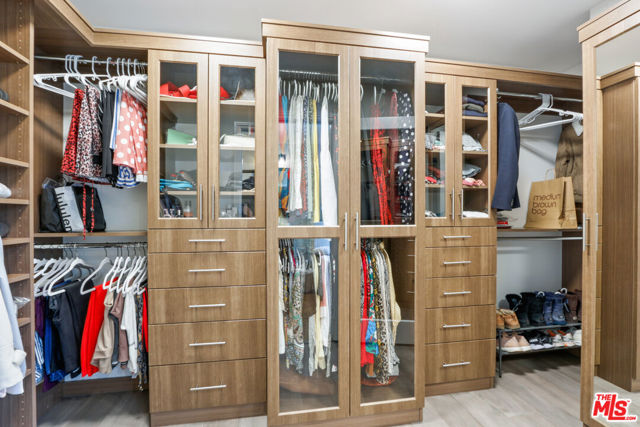 PRIMARY BEDROOM WALK-IN CLOSET