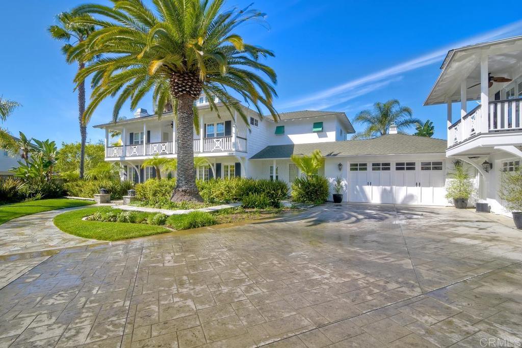 West Indies style Plantation home in Carlsbad (La Costa) This amazing custom home was built in 2004 and no detail was overlooked. White beard board, wainscoting & crown molding throughout, high ceilings and a gorgeous entrance are just a few of the custom features that separate this home from all others. Home is 4676 square feet, 4 bedrooms, 4.5 baths, an office downstairs & a bonus room upstairs. All bedrooms feature attached full baths, large back yard with pool, spa, Bbq, and plenty of space to entertain. Parks, shopping, dining, & cinepolis Luxury Cinema are walking distance. San Dieguito Schools, La Costa Heights Elementary, Oakcrest middle, La Costa Canyon high. MUST SEE!