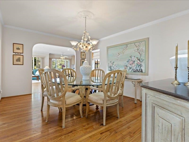 Formal dining room off the living room and then flows into the family room and kitchen